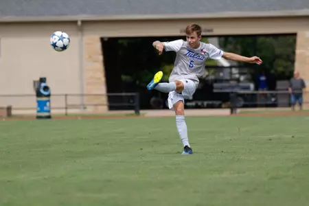 Chase Bromstedt kicking a soccer ball