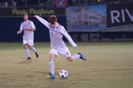 Chase Bromstedt kicking a soccer ball