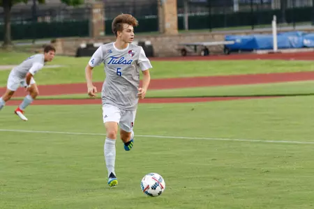 Chase Bromstedt kicking a soccer ball