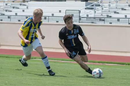 Mitchell Cashion kicking a soccer ball