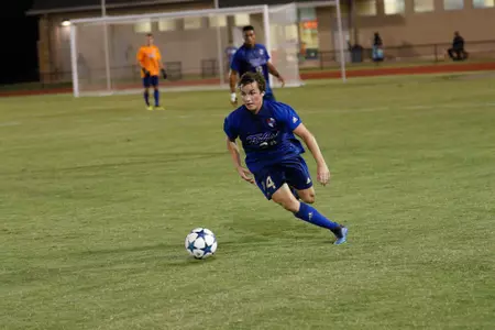 Mitchell Cashion kicking a soccer ball