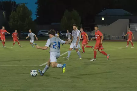 Mitchell Cashion kicking a soccer ball