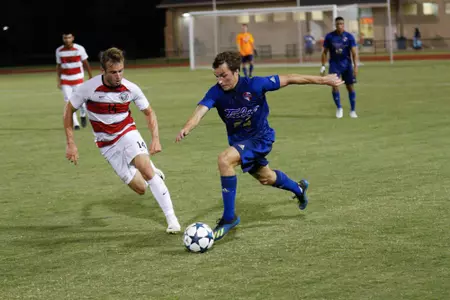 Mitchel Cashion kicking a soccer ball