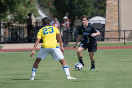 Mitchell Cashion kicking a soccer ball