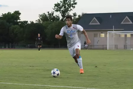 Alejandro Chavez kicking a soccer ball