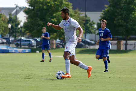 Alejandro Chavez kicking a soccer ball