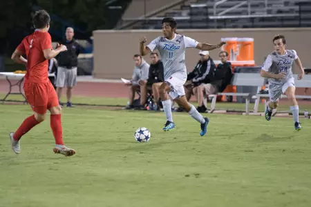 Alejandro Chavez kicking a soccer ball