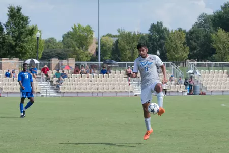 Alejandro Chavez kicking a soccer ball