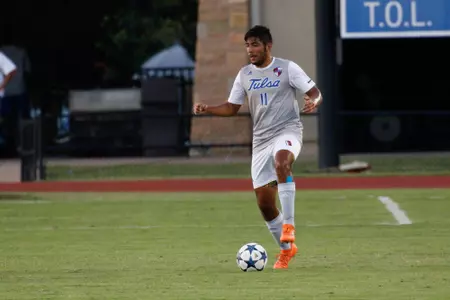 Alejandro Chavez kicking a soccer ball