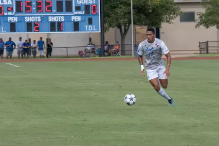 Koray Easterling kicking a soccer ball