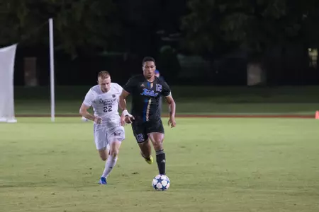 Koray Easterling kicking a soccer ball