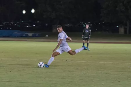 Koray Easterling kicking a soccer ball