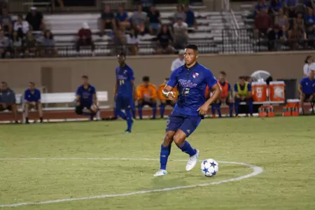 Koray Easterling kicking a soccer ball