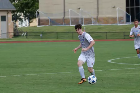 Sean Gavin kicking a soccer ball