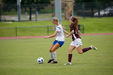 Addyson Guthrie playing soccer