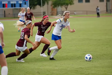 Addyson Guthrie playing soccer