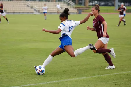 Neha Igwe playing soccer