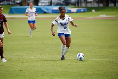 Neha Igwe playing soccer