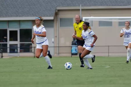 Neha Igwe playing soccer