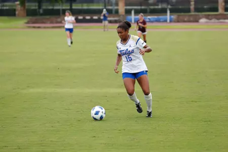 Neha Igwe playing soccer