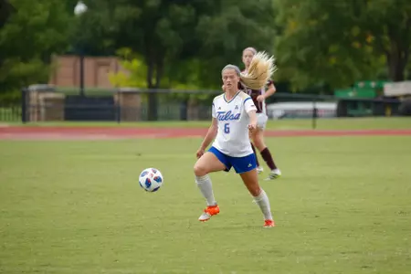 Alyssa Kaiser playing soccer