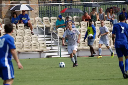Gilles Kuhler kicking a soccer ball