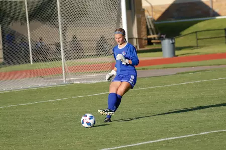 Mica MacKay playing soccer