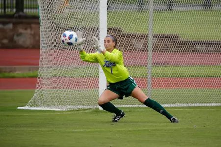 Mica MacKay playing soccer