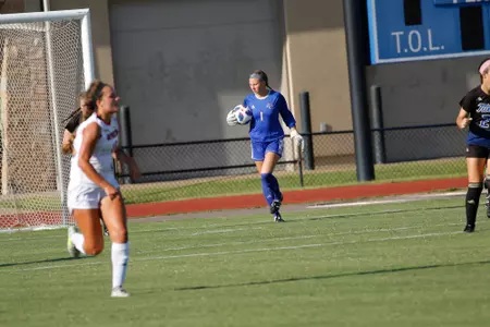 Mica MacKay playing soccer