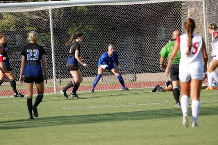 Mica MacKay playing soccer