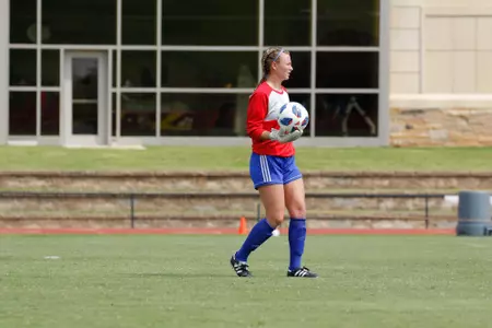 Mica MacKay playing soccer