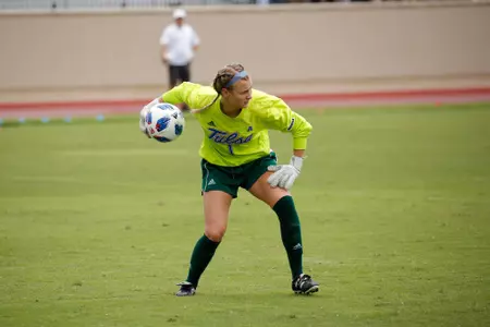 Mica MacKay playing soccer