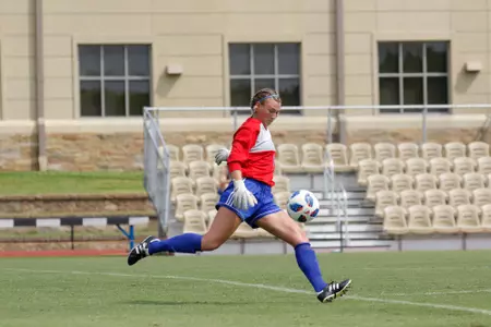 Mica MacKay playing soccer