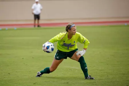 Mica MacKay playing soccer