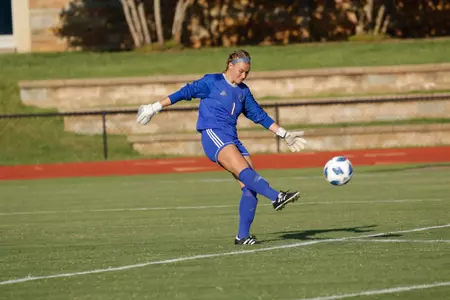 Mica MacKay playing soccer