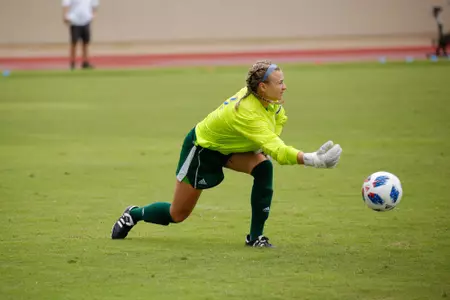 Mica MacKay playing soccer