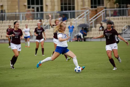 Valiree Morris playing soccer