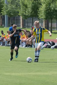 Alex Partain kicking a soccer ball