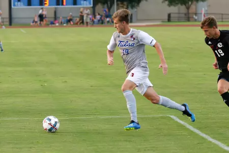 Harris Partain kicking a soccer ball