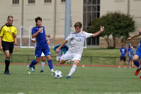Harris Partain kicking a soccer ball