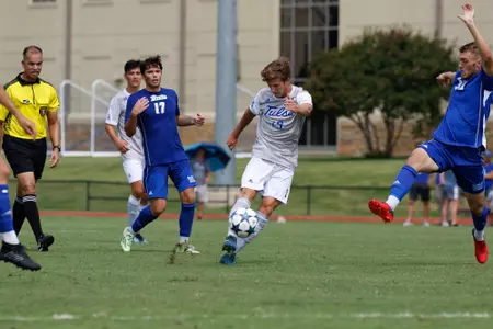 Harris Partain kicking a soccer ball