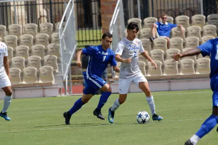 Joe Ruiz kicking a soccer ball