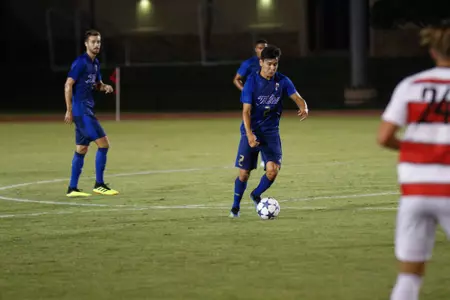 Joe Ruiz kicking a soccer ball