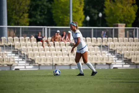 Reagan Whitlow playing soccer