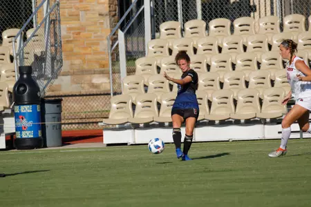Anna Williams playing soccer