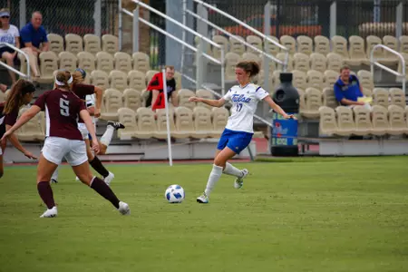 Anna Williams playing soccer
