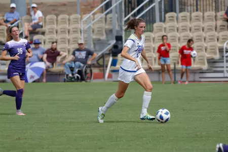 Anna Williams playing soccer