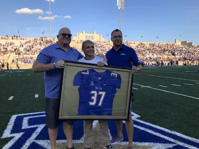 Hometown Heroes pose for pictures at 2018 game