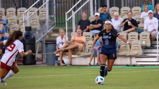 Liliana Fernandez playing soccer