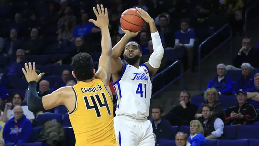Jeriah Horne shoots the ball against Wichita State